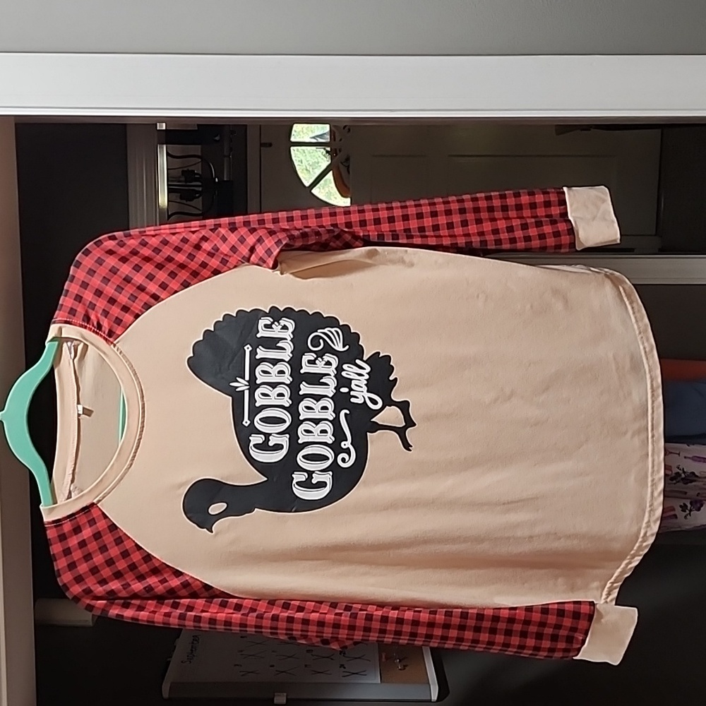 Boutique Thanksgiving Shirt. Size Large. It fits more like a medium.